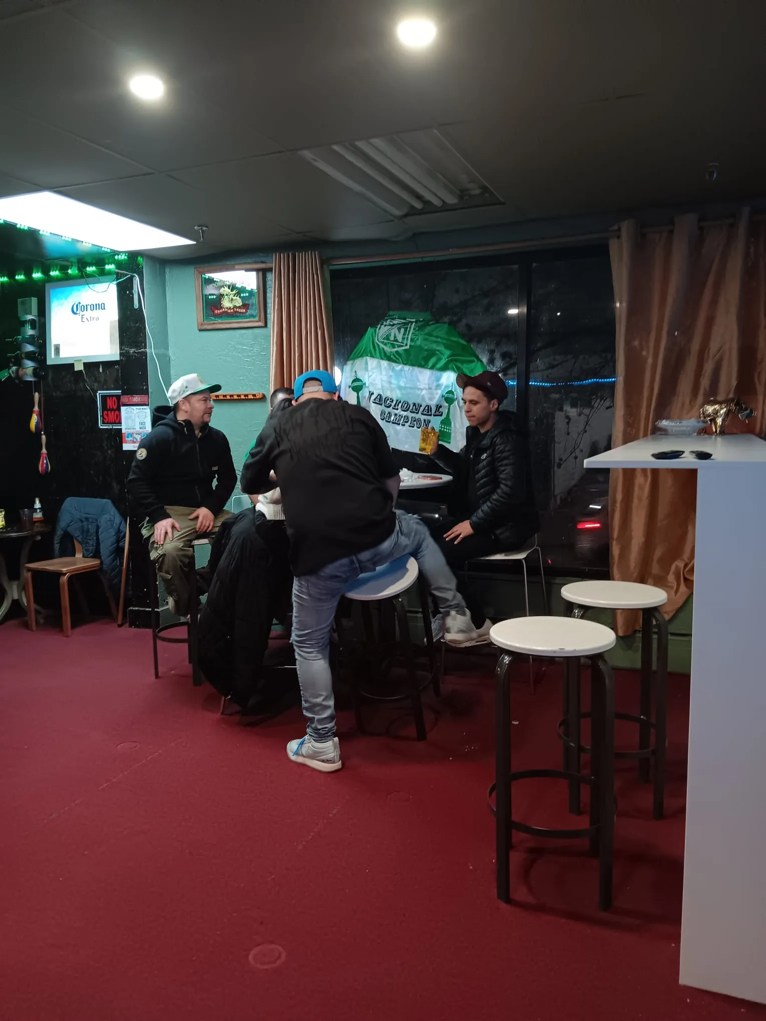 People drinking around a table
