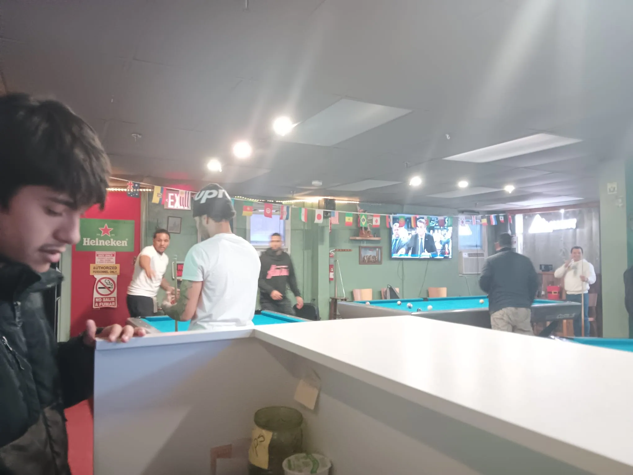 A couple playing billiards